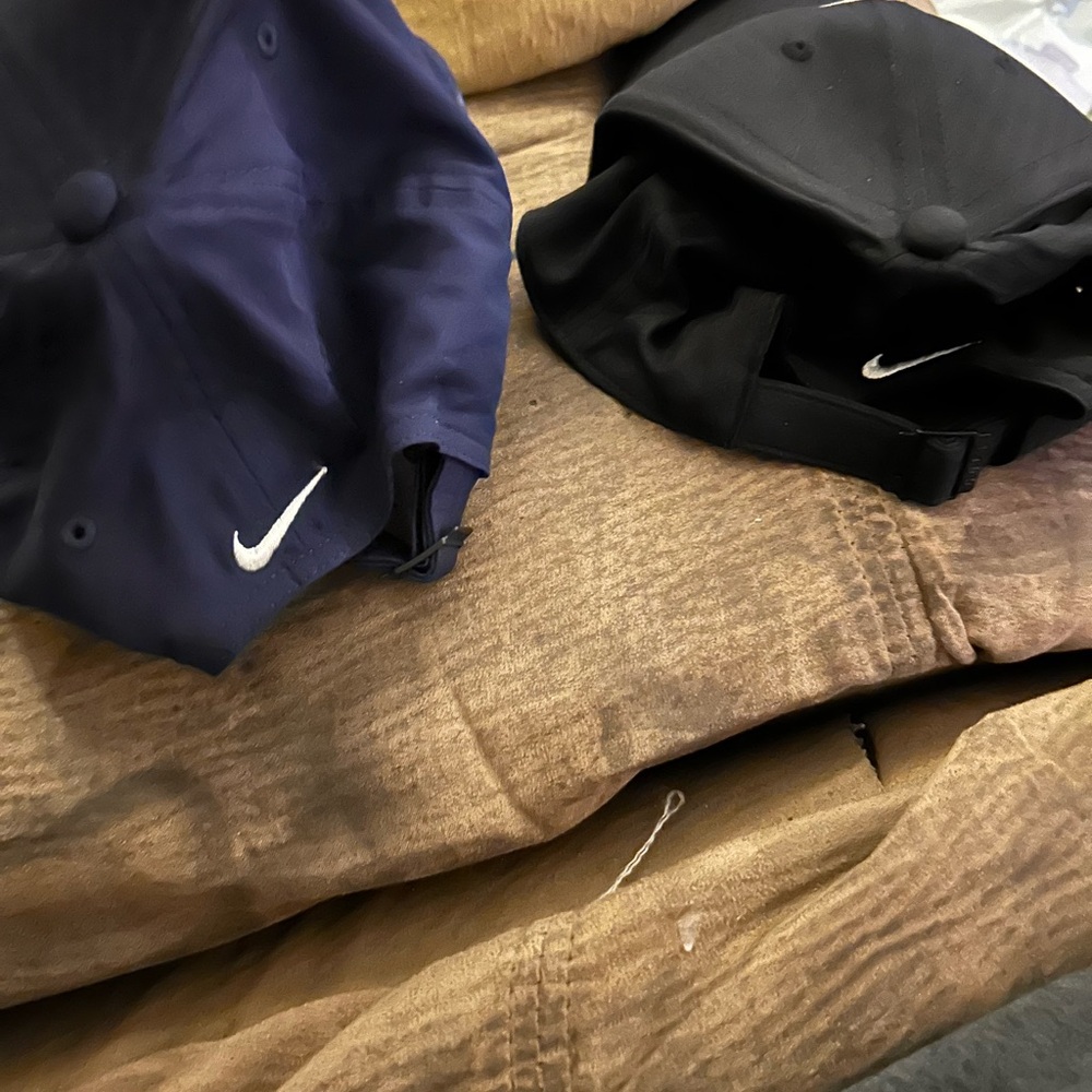 Blue and black ball caps